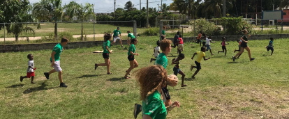 Sports Coaching volunteers play games with schoolchildren in Belize Projects Abroad Sports Coaching volunteers play games with schoolchildren in Belize